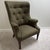 This gently loved ‘Isaac’ wing chair by Hickory Chair Furniture Company is a transitional piece featuring exquisite olive...