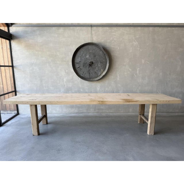A Huge French Elm Farmhouse Table with 8cm thick 2 plank top. Of typical French vernacular construction dating back to the...