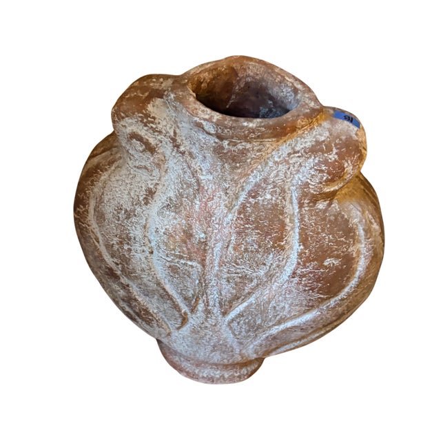 A substantial and beautifully weathered hand-thrown terracotta floor jar in the Mediterranean amphora tradition. The...