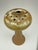 This beautiful vase, with its vibrant, flowing glaze in earthy colors and its organic, mushroom-like shape, is typical of...