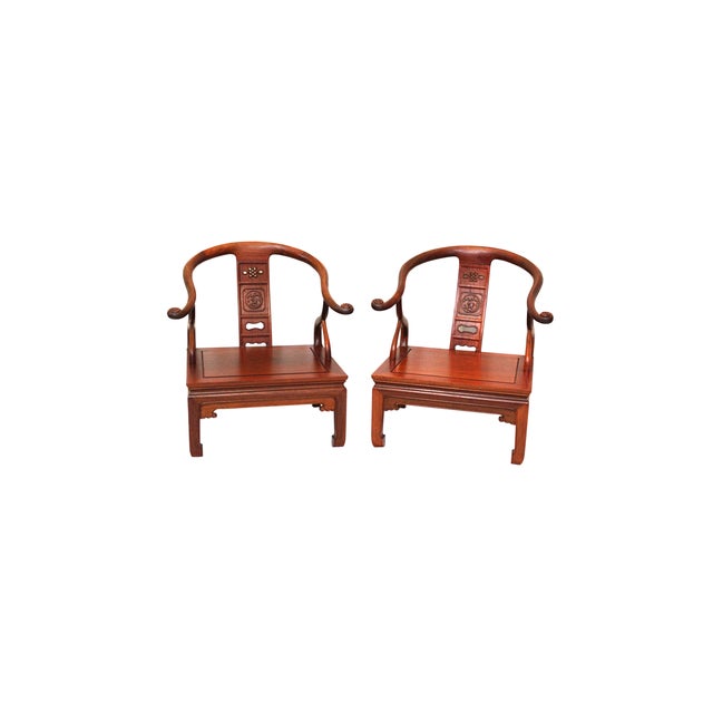 A striking pair of vintage Chinese horseshoe armchairs, inspired by the refined elegance of Ming dynasty design. Known for...