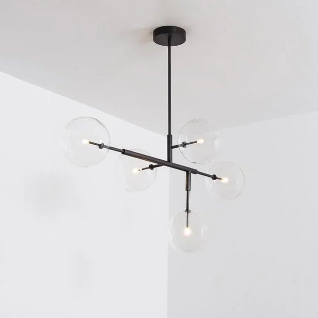 Black gunmetal contemporary pendant light by schwung dimensions: d 72.4 x w 150.6 x h 174.4 cm materials: solid brass,...