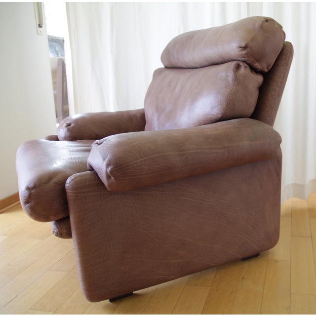 The leather is undamaged and in excellent condition. High-back chair with durable, thick buffalo leather neck leather....