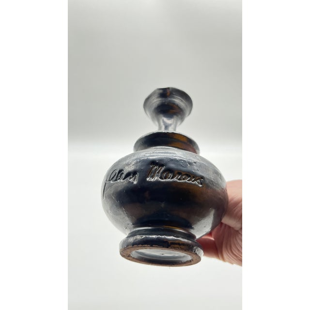 Good evening, I am selling this black glazed ceramic carafe signed by Jean Marais. Very good condition. [ by Art Angelux]...