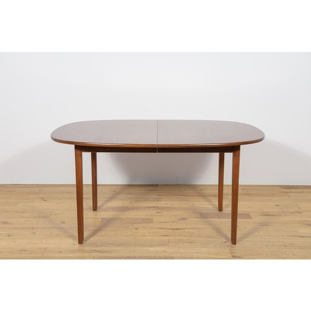 The Table Rungstedlund was designed by Ole Wanscher and manufactured in the 1960s and 1970s by Poul Jeppesen in St....