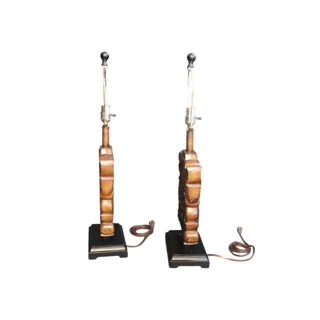 Get ready to add some leafy flair to your space with these two elegant wood carved lamps - they're sure to leaf you...