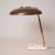 Original 1950s Oscar Torlasco desk lamp with original brown paint shade. Marble base and brass elements. In good overall...