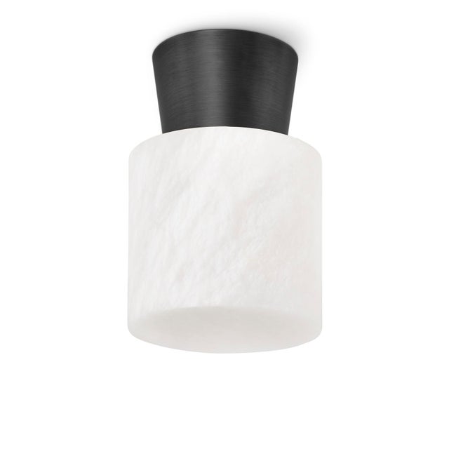 Mid-Century Modern vibes abound with the Hazel Alabaster Flush Mount fixture. A small gem of a light that serves as an...