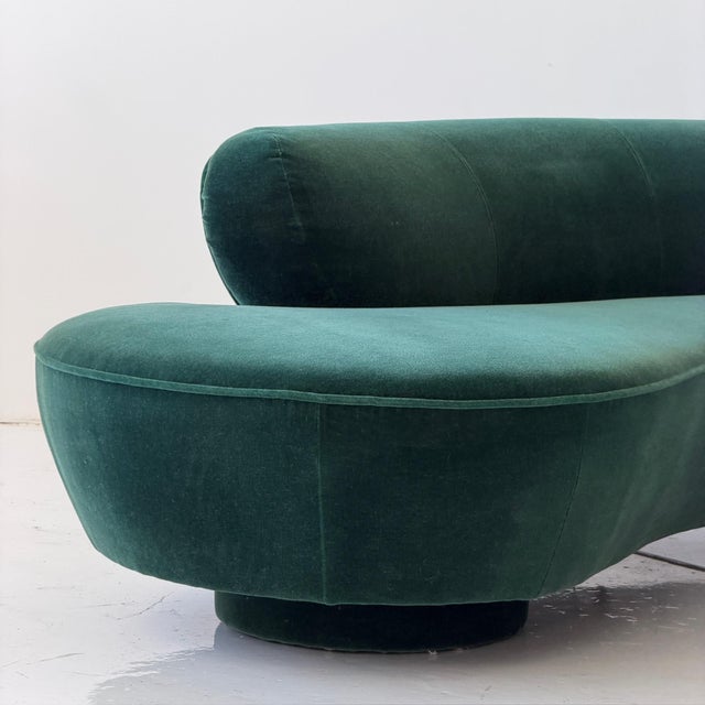 c. 1980s. USA. Reupholstered in green mohair. Lucite leg on bottom in the middle. Tagged. A classic of postmodern design.