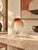 A striking “Mesa Sunrise” art glass vase from the Evolution by Waterford collection, crafted in Poland. This sculptural...