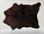 Natural rich espresso color calf hide with beautiful glossy sheen. Small in scale but same hair on hide as a full size...