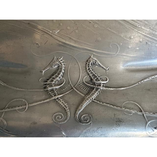 Beautifull pewter platter called Kayserzinn or Kayserzinn in Germany. A sturgeon. octopus, sea horses, fish and crabs are...