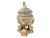 Large scale vintage faience urn decorated in vibrant yellow, blue, and green glazes with scrolling foliate motifs and...