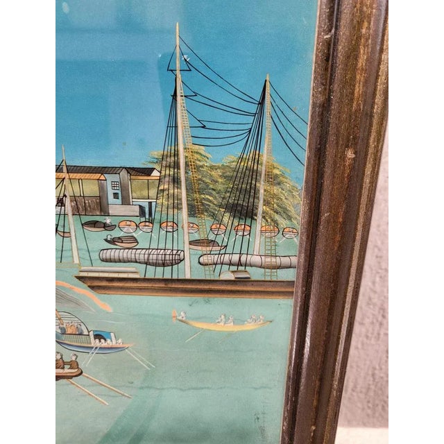 Large glass mount depicting a Chinese harbor scene in the background, with boats flying various flags, rowers, and life on...