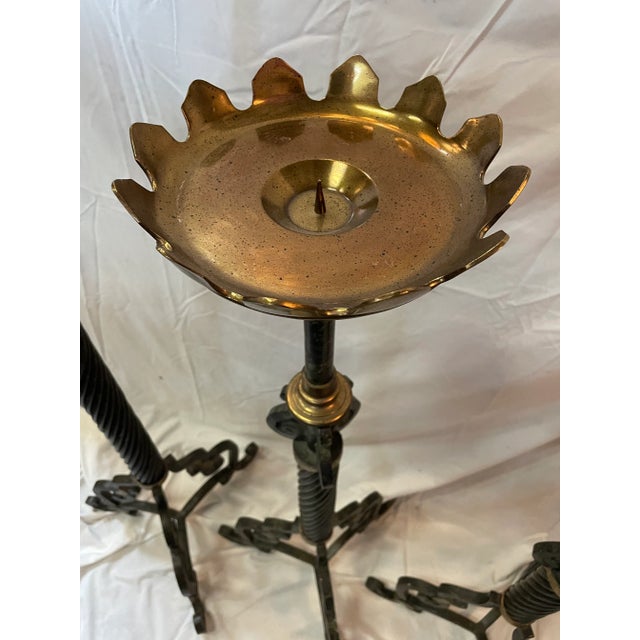 Three large heavy iron and brass high end Maitland Smith candleholders in really nice condition they measure approximately...