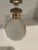 Art Deco pinched glass decanter with sterling silver overlay and stopper. "Scotch" is written on the front in silver...