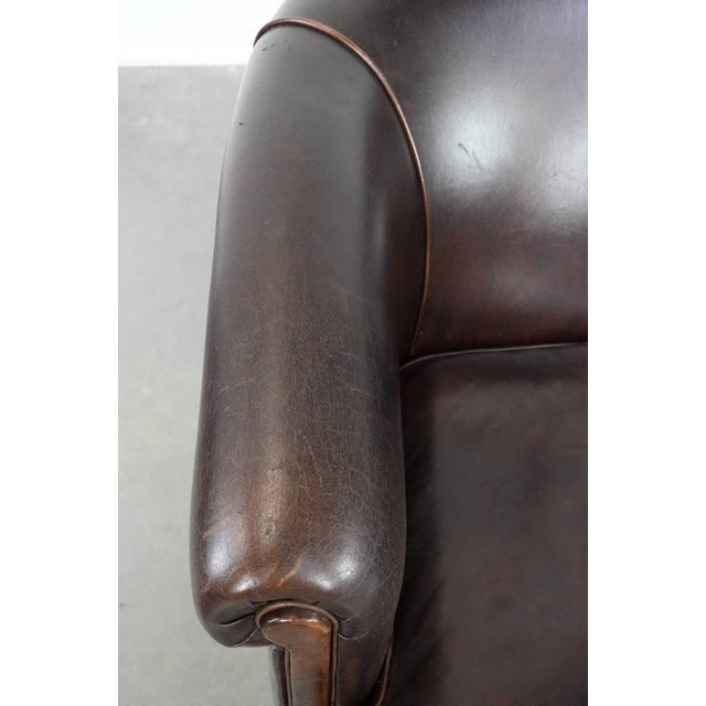 Animal Skin Stylish and Characterful Dark Brown Vintage Club Armchair in English Style Made of Sheepskin with Matching Piping For Sale - Image 7 of 16