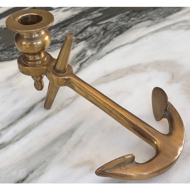 Here is a vintage solid brass candle holder for a touch of maritime! Heavy for its size and made with the quality of...