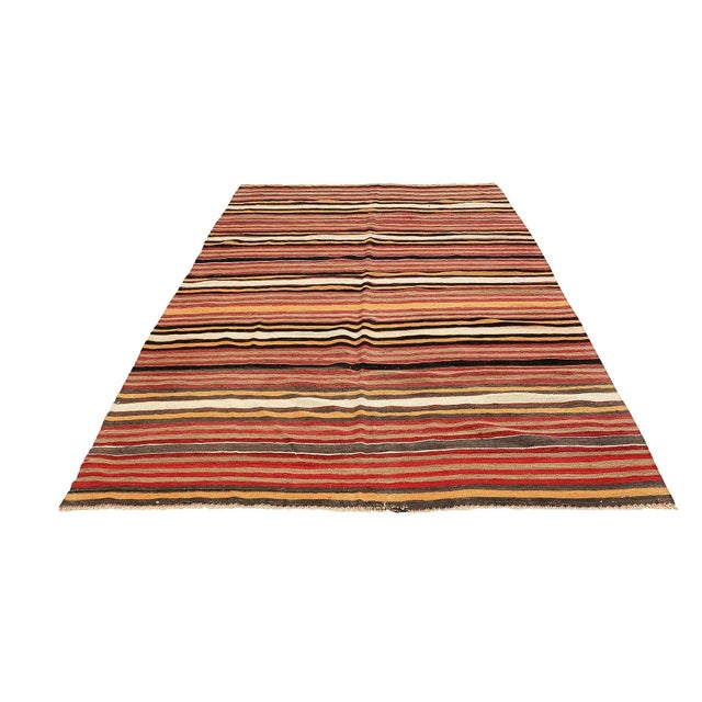 Handwoven vintage striped kilim rug from Denizli region of Turkey. Approximatelly 45-55 years old. In very good condition.