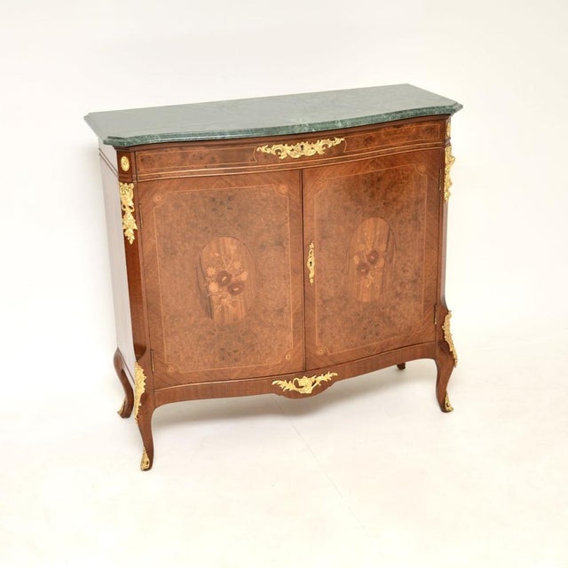 A beautiful antique French burr walnut marble top cabinet, this dates from around the 1930’s. It is of superb quality,...