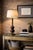 An elegant oversized table lamp showcasing a refined blend of classic form and warm material contrast, this vintage 1970s...