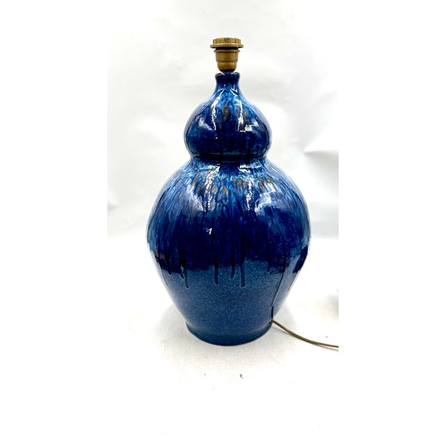 Important stoneware lamp base from Puisaye, made by Normand, with a stamp on the base. Sold without the lampshade. This...