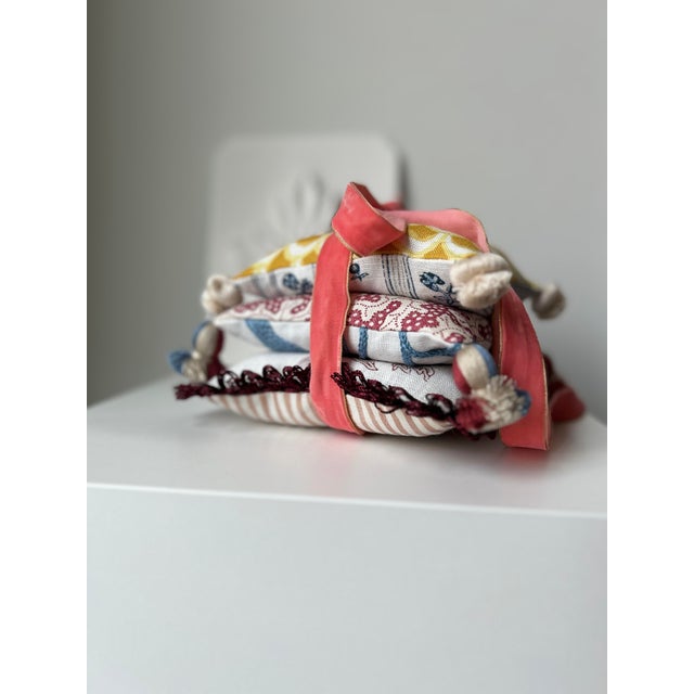 Set of three decorative pillows filled with fragrant dried lavender. Pretty enough to display, then can also be tucked...