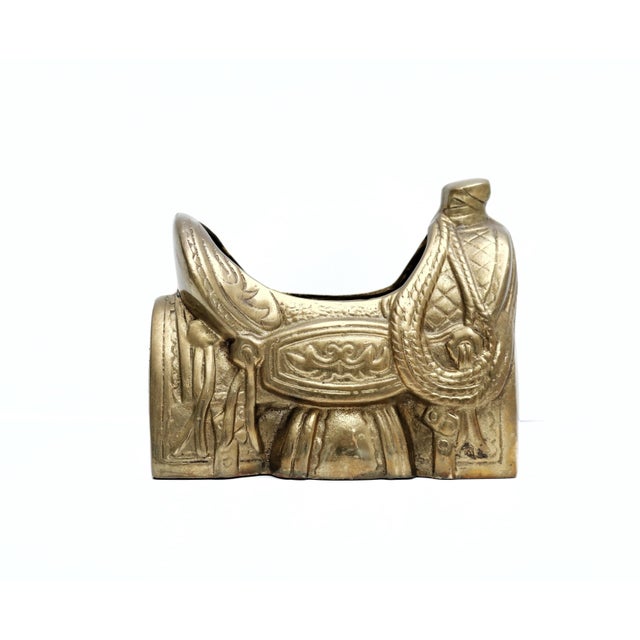 Brass Saddle Planter. This listing is for a vintage saddle planter. This charming saddle has a lovely design and dark aged...