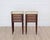 Made in France in the twentieth century, this pair of Louis XVI style bedside in wood veneer, each opening with three...