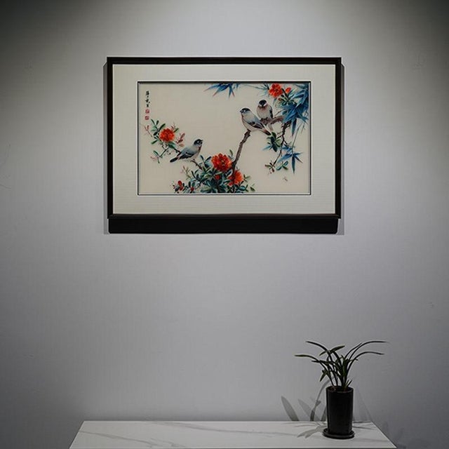 This exquisite handcrafted Suzhou embroidery (Su Xiu) artwork features a graceful composition of blooming flowers and...
