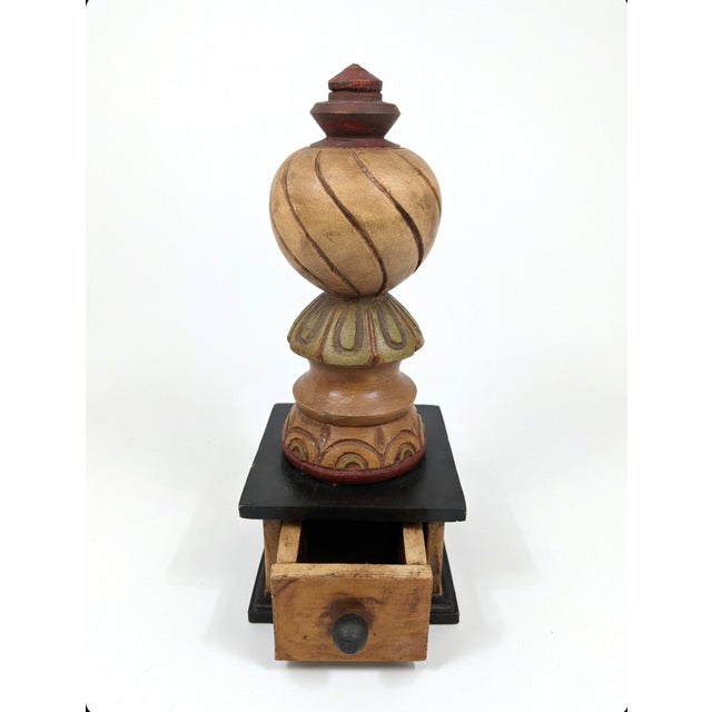 A one-of-a-kind decorative finial, expertly hand-carved from solid wood in the classic early 20th-century revival style...