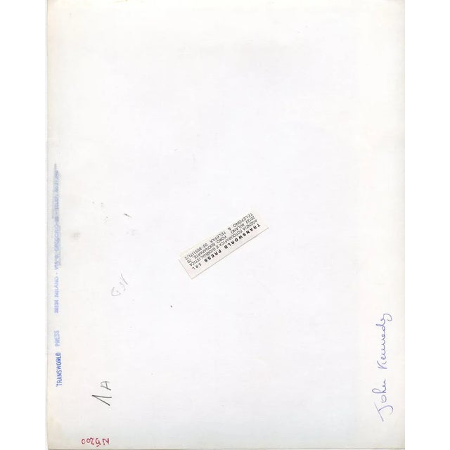 John Fitzgerald Kennedy at the meeting of the UN is a b/w photograph picturing President Kennedy at the United Nations...