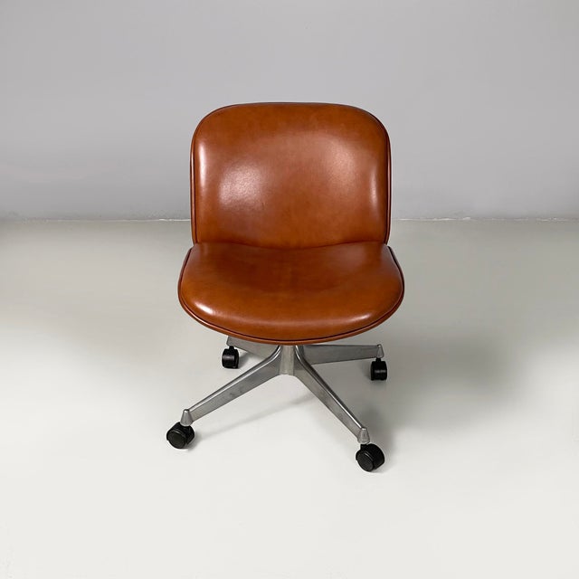 Italian modern office chairs by Ico Parisi for MiM, 1970s Set of eight office chairs or armchairs with padded seat and...