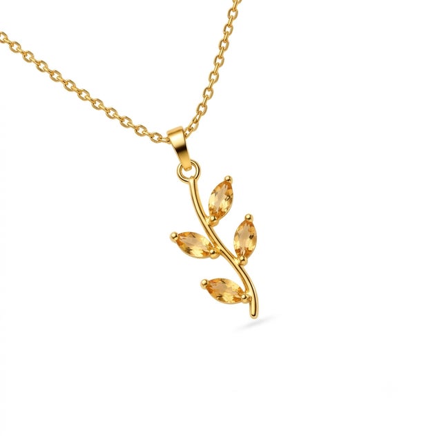 Bring a touch of warm sunshine into your day with this golden leaf branch pendant. Adorned with glowing natural Citrine...