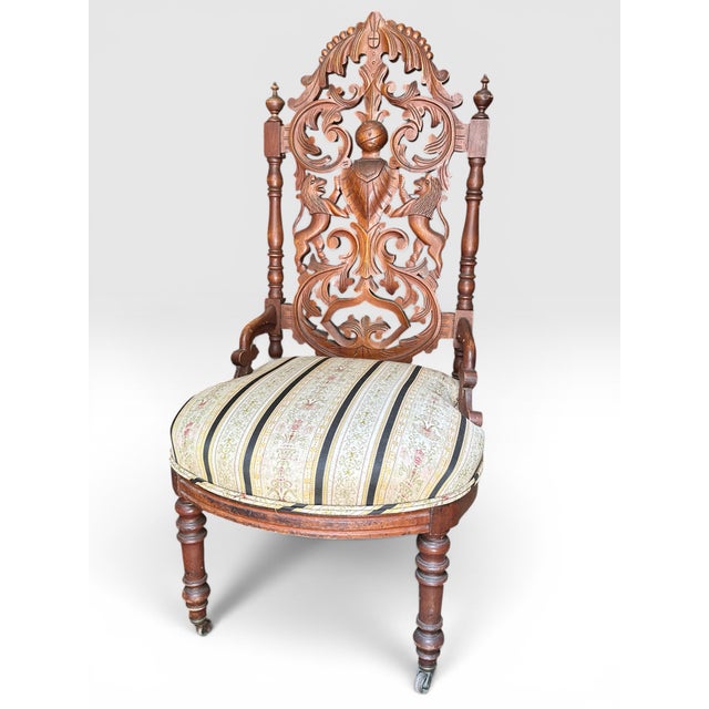 19thC Victorian Renaissance Revival Carved Walnut Armorial Slipper Chair An exceptional example of 19th century American...