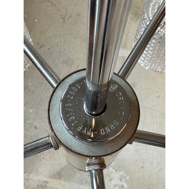 A vintage five-arm chandelier manufactured by Drukov Brno in Czechoslovakia, dating to the 1960s. This Mid-Century Modern...