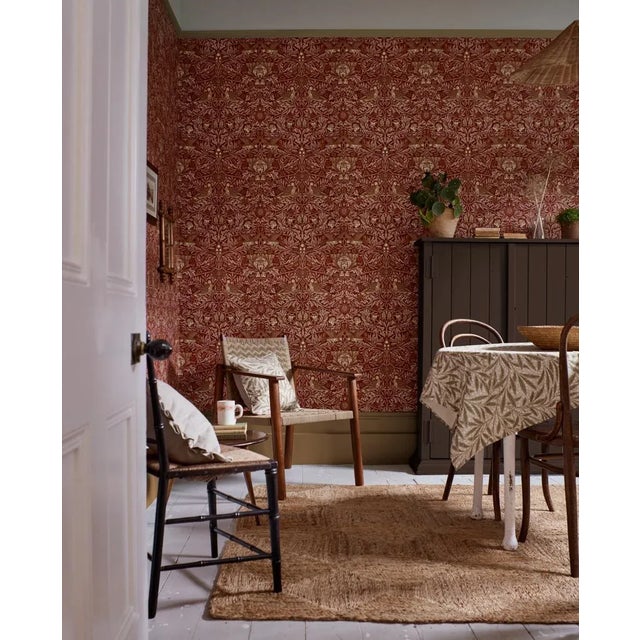 Translated on to wallpaper for the first time Bird is a serene pattern of paired birds alternating between perching and...