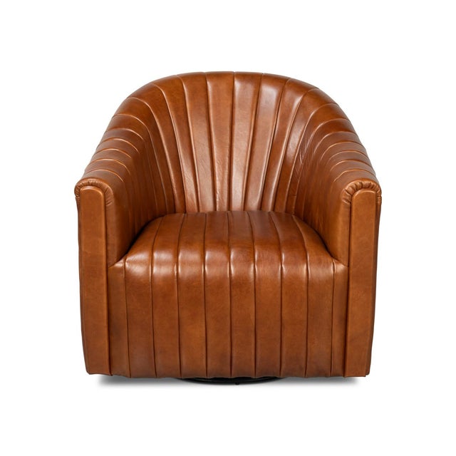 This classic barrel-shaped swivel chair is upholstered in premium top-grain Havana brown leather, offering a luxurious...