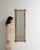 Here is a mirror, its natural weathered oak frame, tall narrow the first thing to catch the eye. The piece dates to 1970s,...