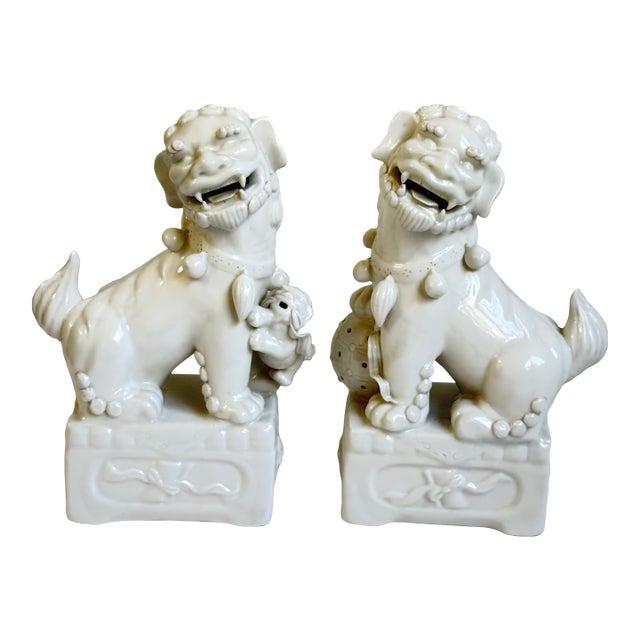 Vintage Blanc De Chine Chinese Ceramic Foo Dogs a Pair For Sale