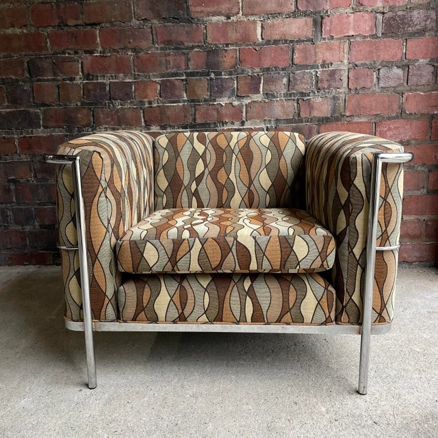 Corbusier style club chair with upholstery and chrome