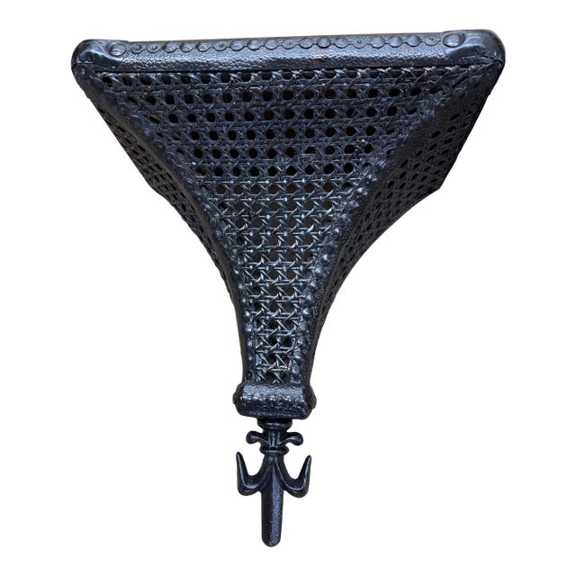 These caned wall shelves are beautifully wrapped with a vinyl like textile and finished with nailheads. The fleur de lis...