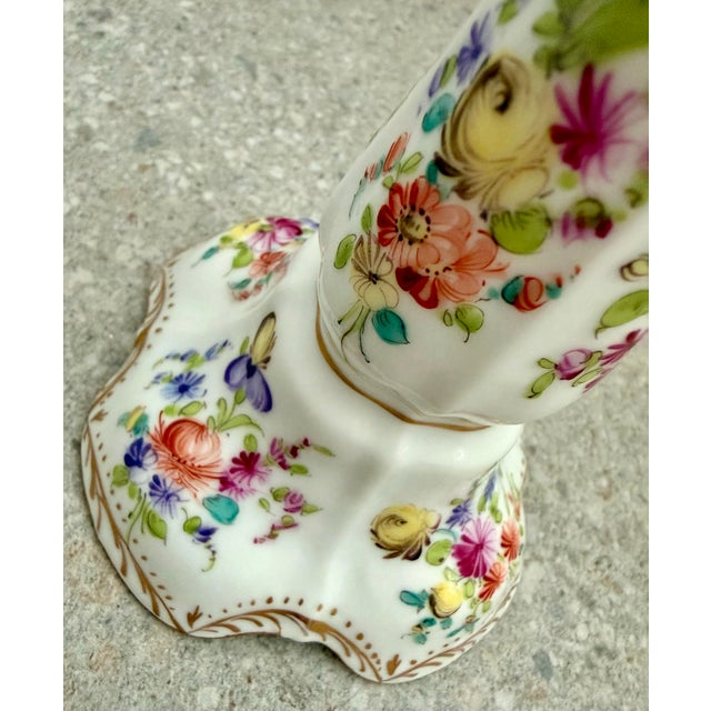 Delicate Dresden Germany hand painted porcelain candlestick. Fluted sides, scalloped top and bottom. A white ground...