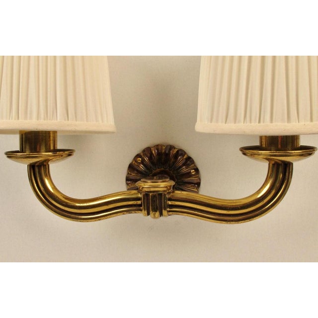 This two armed brass wall light from Hugo Gorge, is an excellent example of Austrian modernism from the 1930's. Flowing...