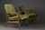 This elegant pair of mid-century modern armchairs was produced in Poland in the 1970s and 1980s. Originally designed in...