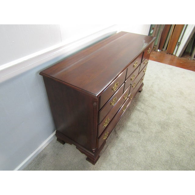 Item: Statton solid cherry dresser. Age:1980's. Details: Dovetailed drawers and Old Towne finish. Measurements: 58" width,...