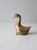 This is a mid-century brass goose figure. The heavy-weight brass bird has great lines and detail.