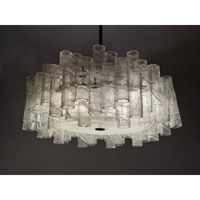 Arguably one of the most exciting and beautiful ice glass tube chandeliers from the Dutch manufacturer Doria Leuchten. 69...