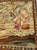 Elegant early 20th-century Aubusson tapestry, showcasing a charming pastoral scene in soft, muted tones. The composition...