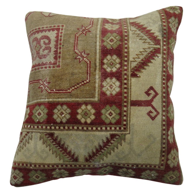 Pillow made from an antique Turkish Sivas rug in camel and crimson red colors. Measures: 17" x 19".